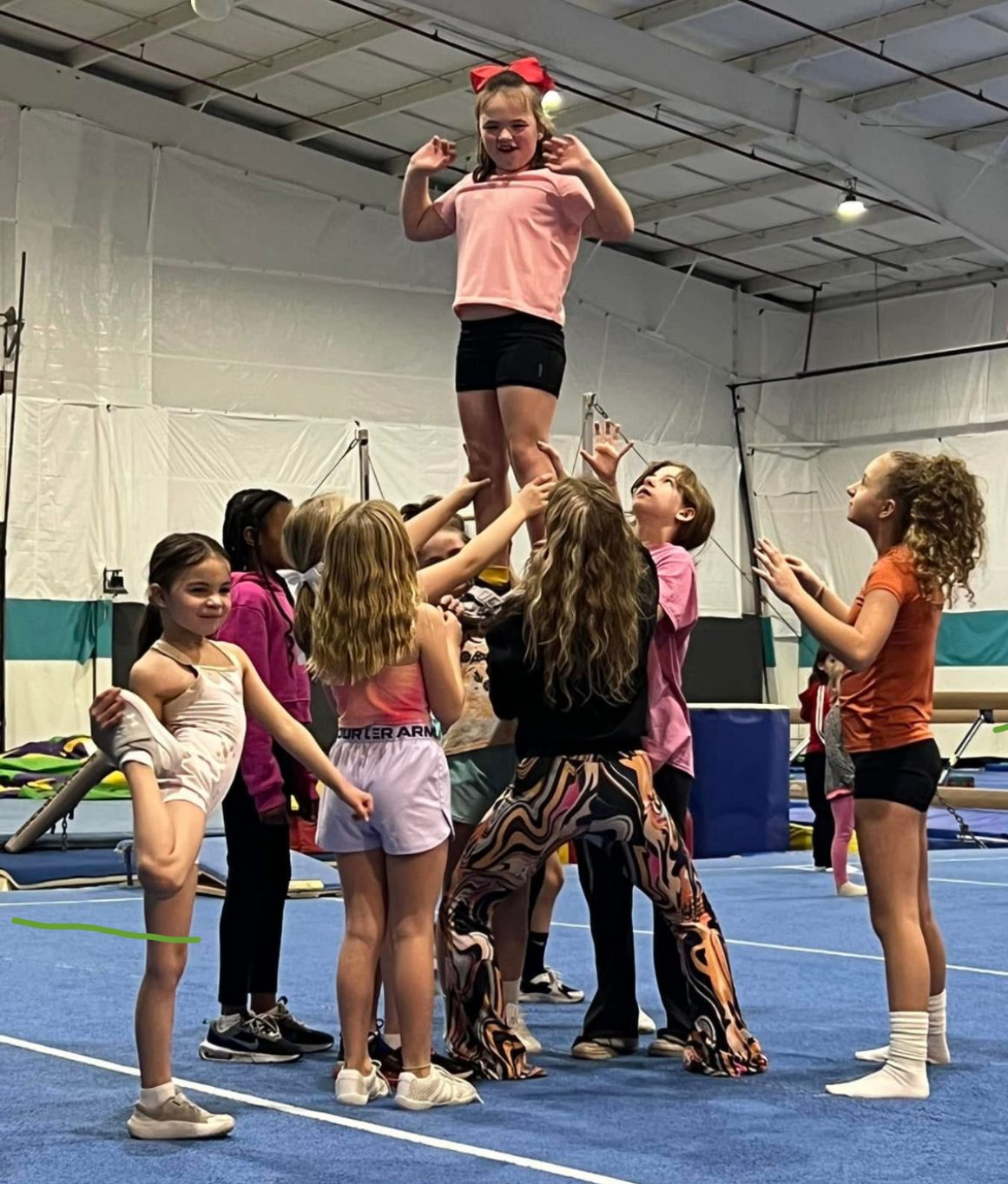 Cheer stunts at The Clubs at River City in Peoria